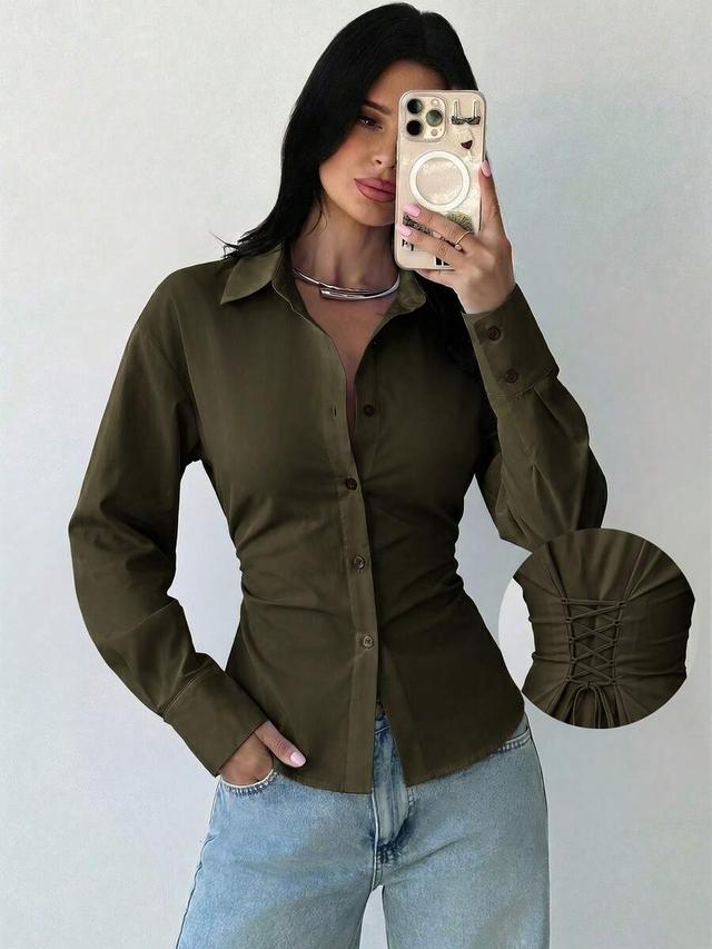 olive green button-up shirt with back lace-up detail
