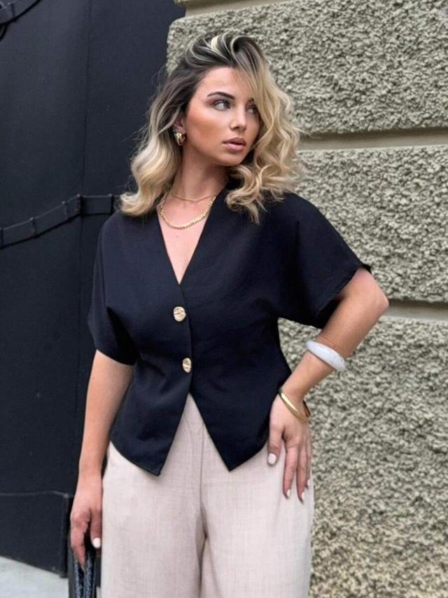 elegant black flared sleeve double-breasted cardigan