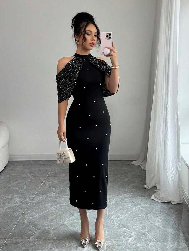 black cold shoulder mini dress with sequin cape detail