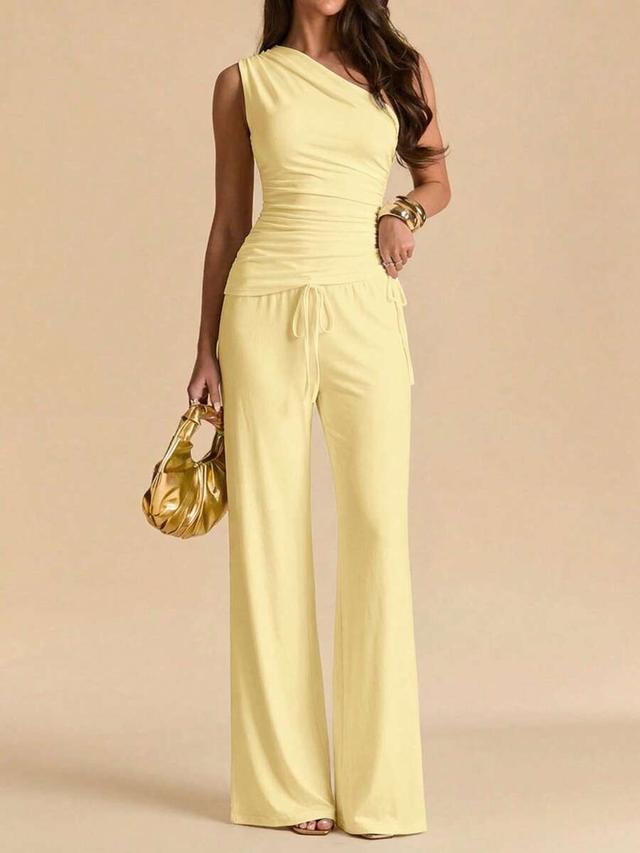 pale yellow one-shoulder top and wide leg pants set