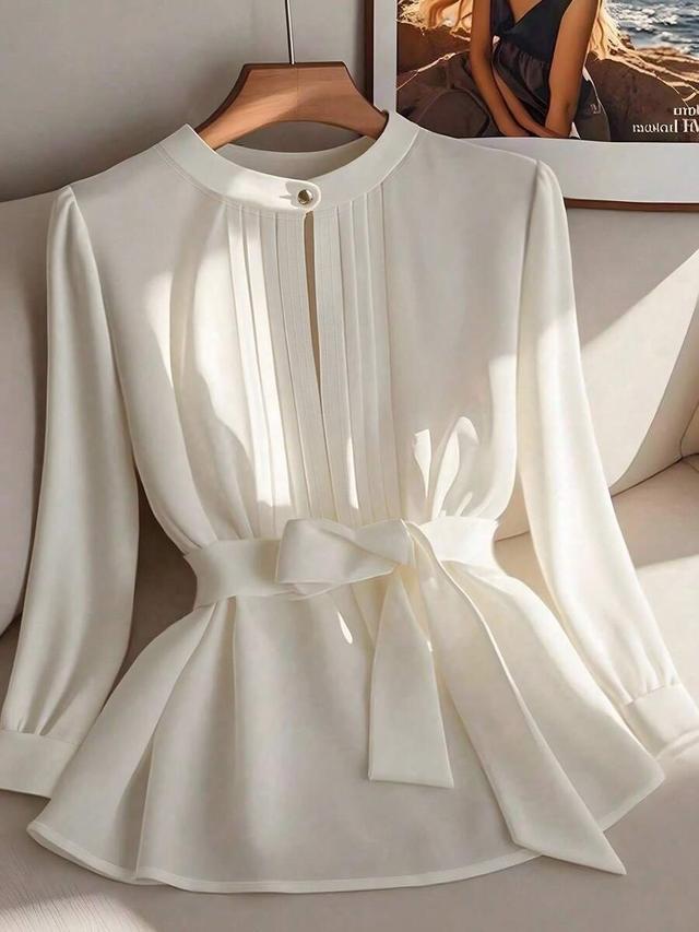 elegant white long sleeve blouse with waist tie