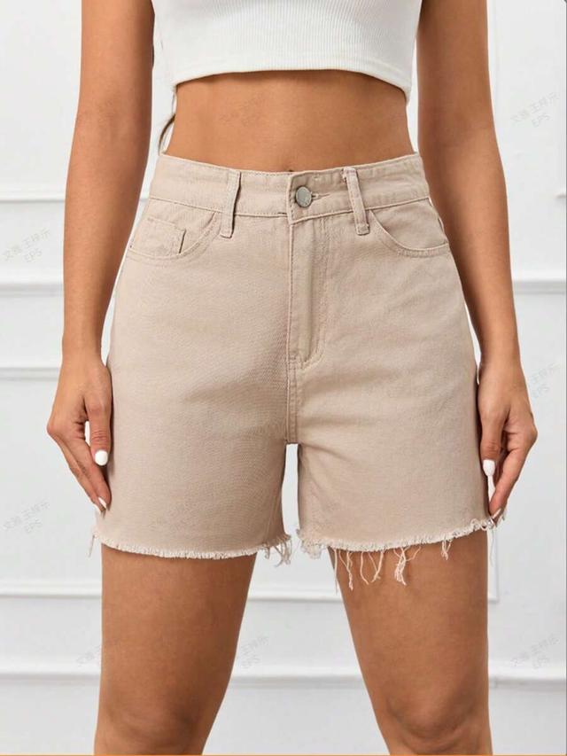beige high-waisted denim shorts with raw hem