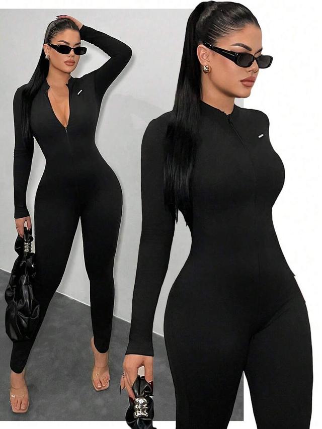 black long sleeve zip-front jumpsuit