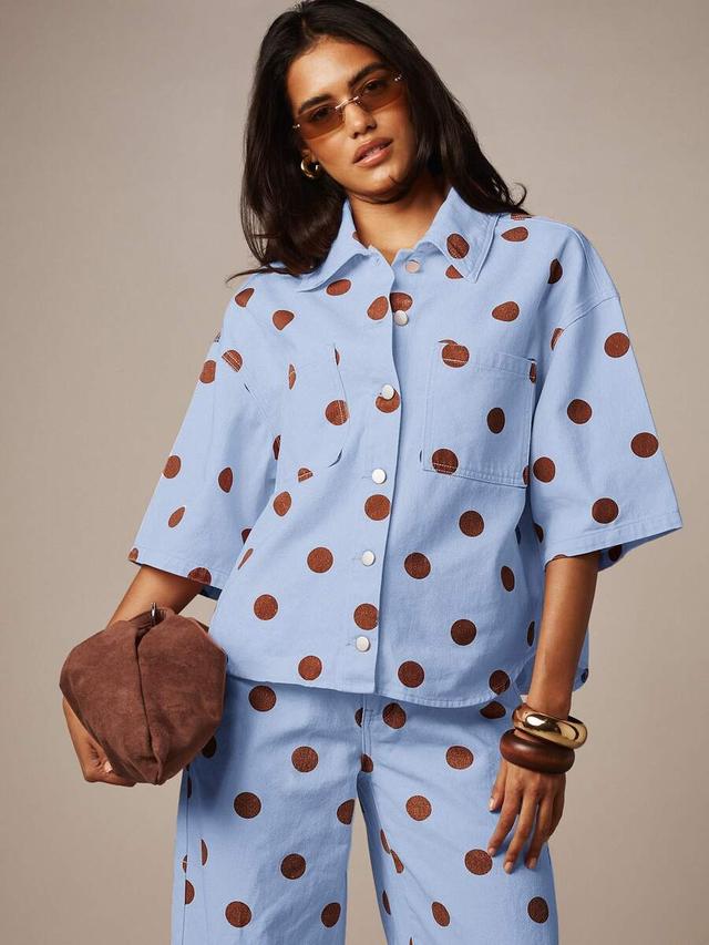 light blue polka dot cotton denim button-up shirt