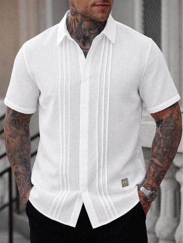 white short sleeve button shirt with pleated front