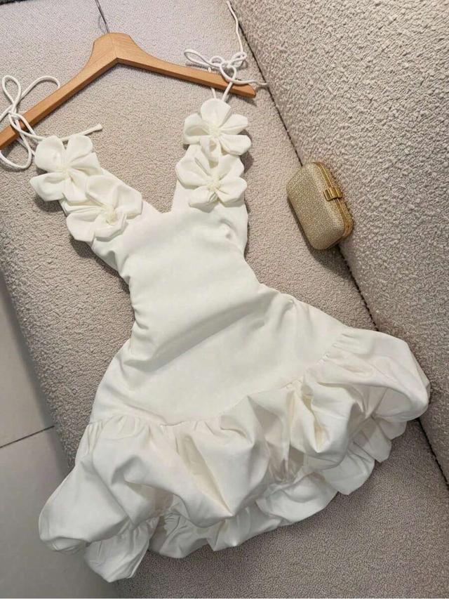 white mini dress with floral strap detailing