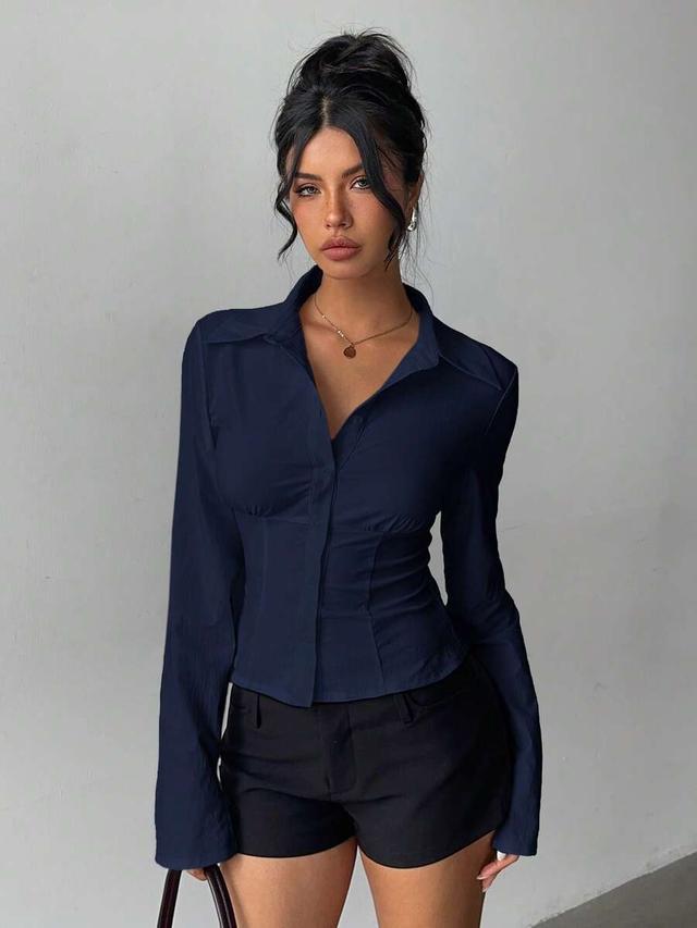 elegant navy blue pleated waist long sleeve blouse