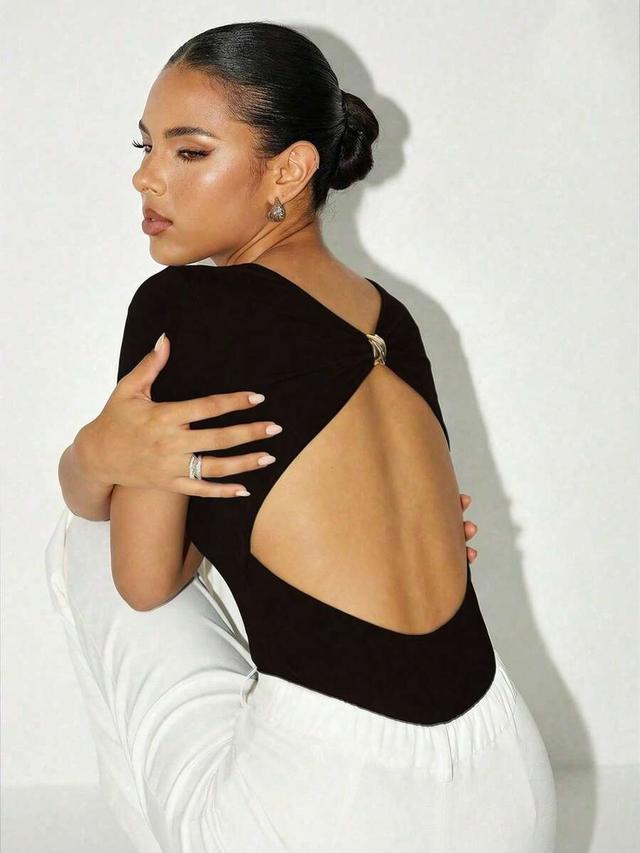 black backless short sleeve bodysuit with metal detail