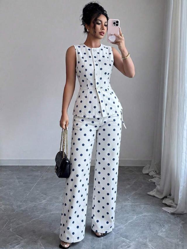 white and navy polka dot sleeveless vest and wide-leg trousers