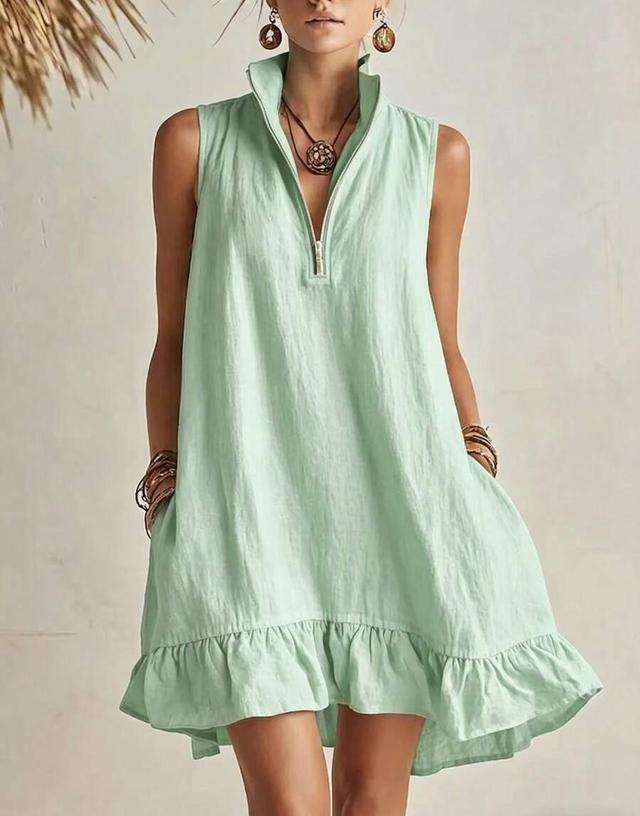 light green sleeveless zip-front ruffle hem dress