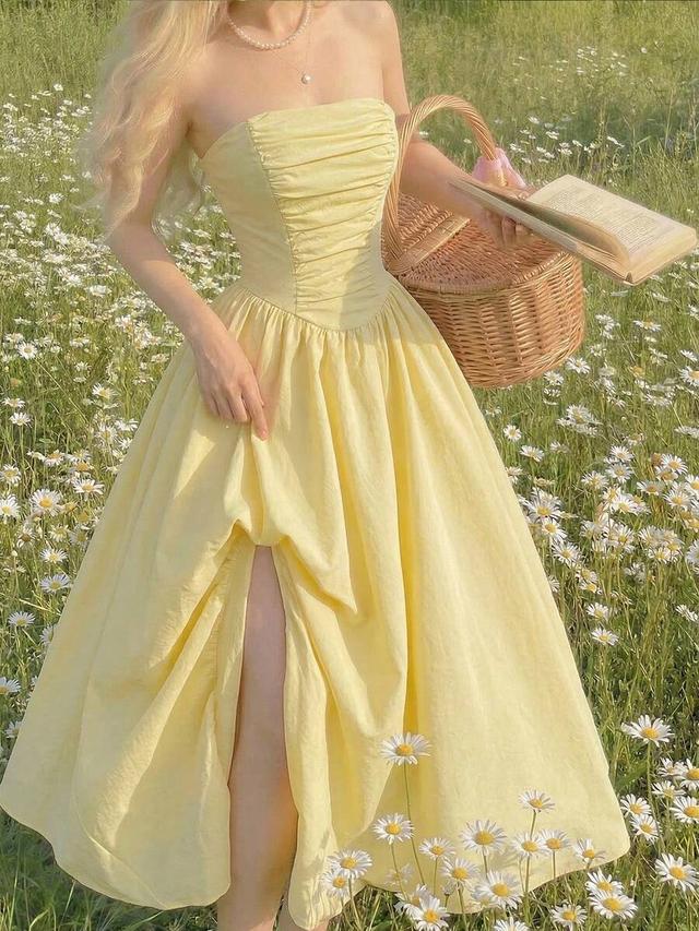 pale yellow strapless ruched corset waist midi dress