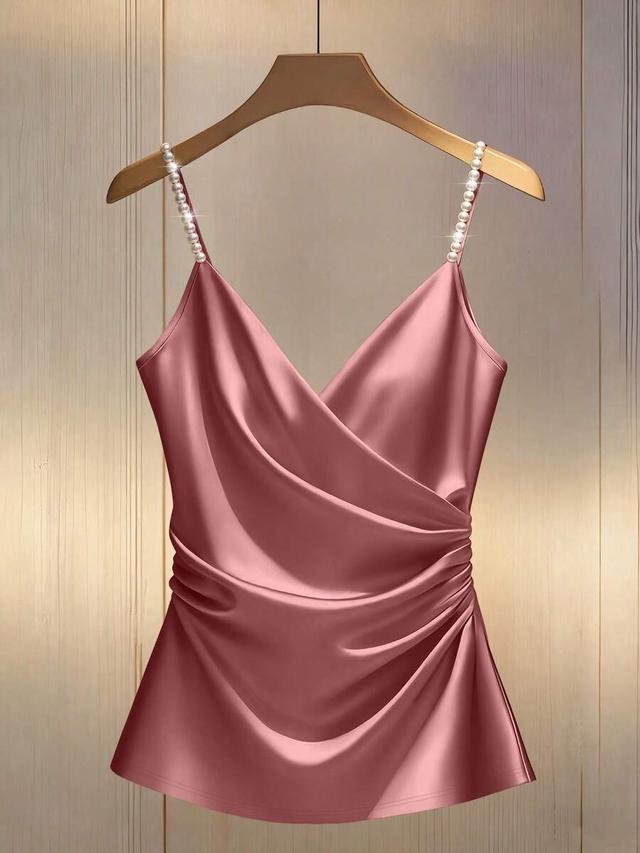 pink satin camisole with pearl strap detail