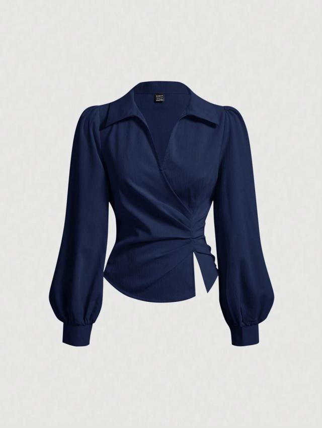 navy blue lantern sleeve pleated wrap blouse