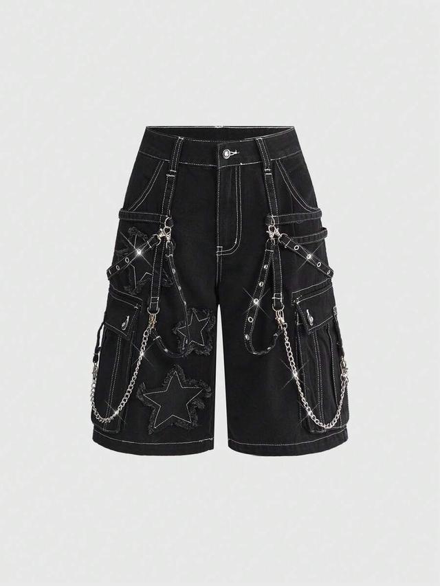 black denim cargo shorts with star patches and chains