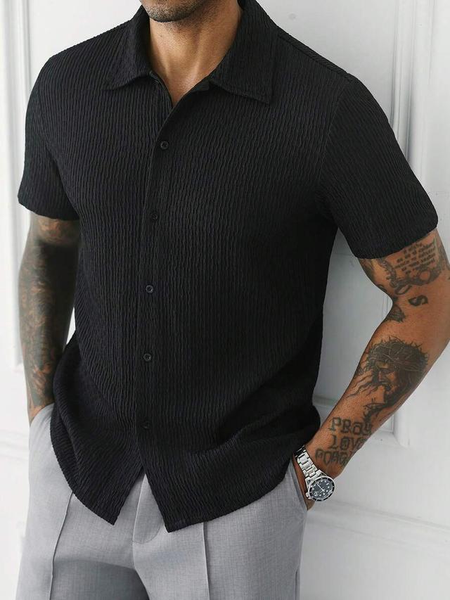 black textured crinkle short sleeve button down shirt