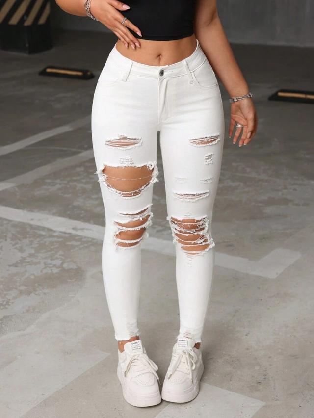 white ripped raw hem skinny jeans