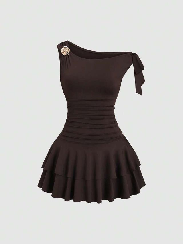 brown asymmetric neckline mini dress with metal flower