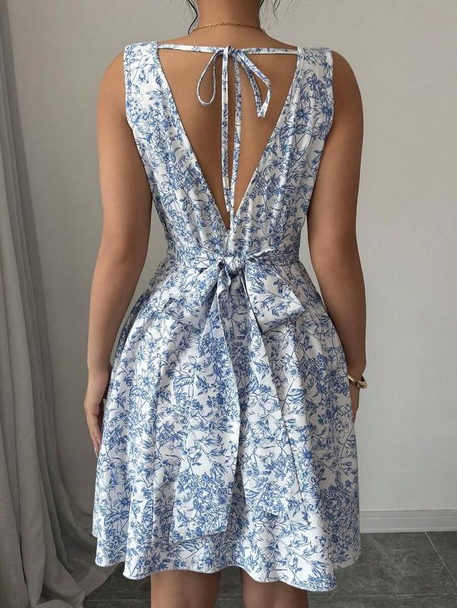 blue and white floral print backless tie dress