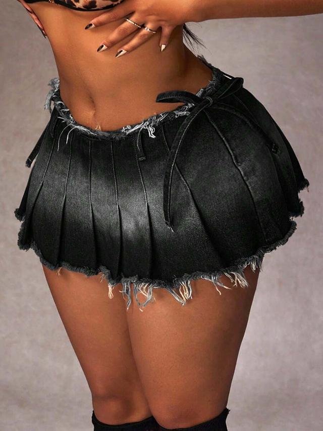 black denim pleated mini skirt with raw hem