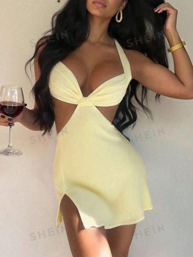 pale yellow halterneck cut-out mini dress