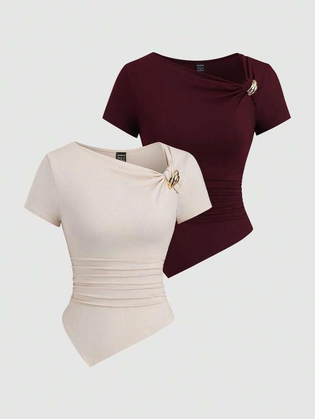 burgundy asymmetrical hem button up short sleeve top