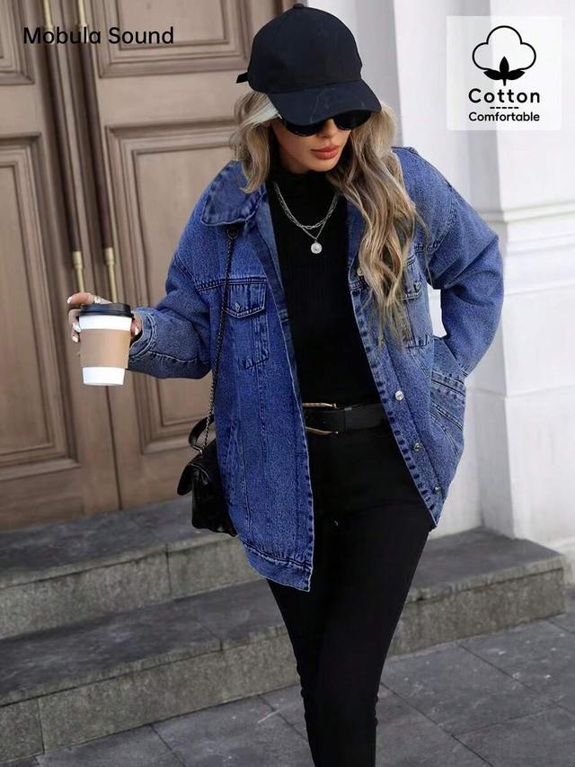 oversized medium wash denim trucker jacket