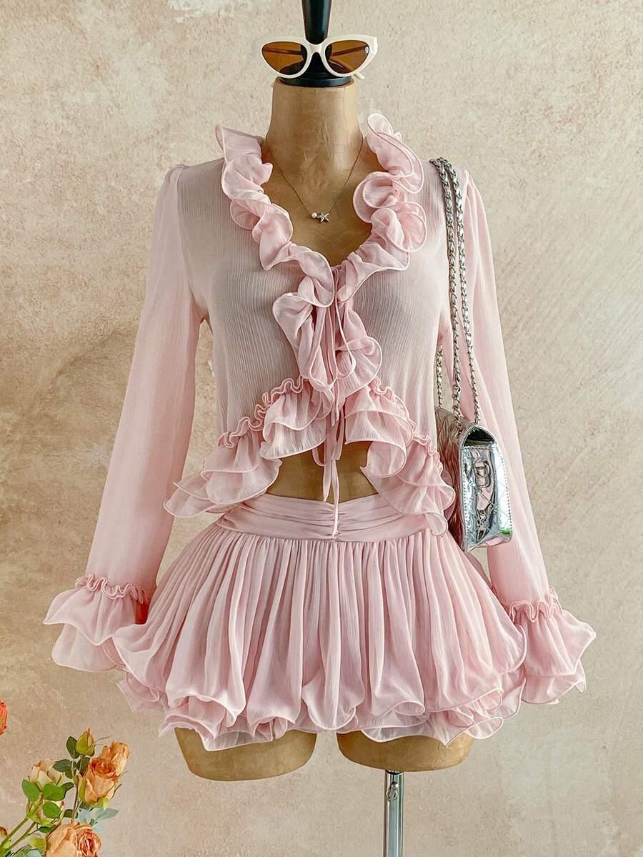 baby pink ruffled tie front cardigan and mini skirt