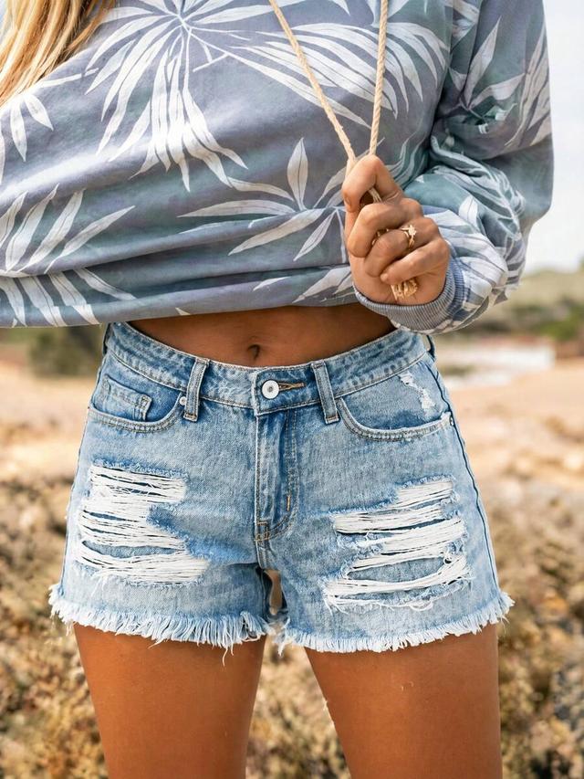 low rise distressed light wash denim shorts