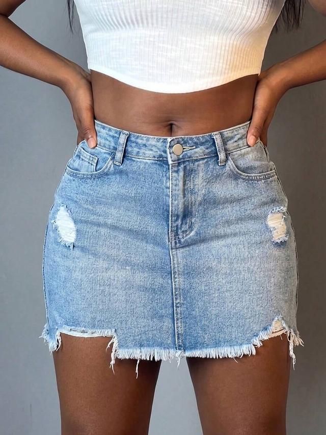 light wash distressed denim mini skirt