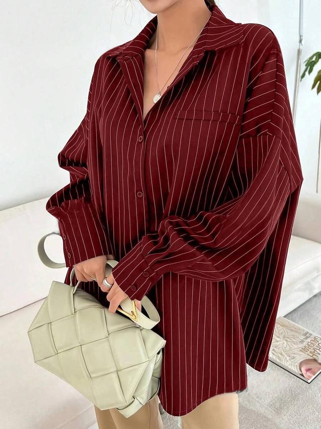 blue and white striped front button pocket long sleeve shirt