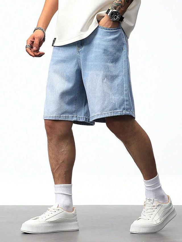 light blue baggy denim bermuda shorts