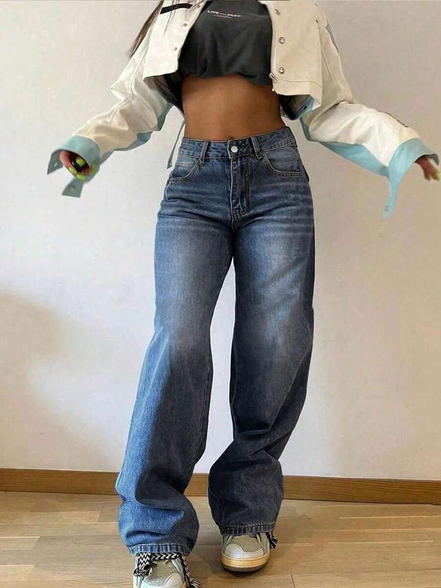 high-waisted medium wash wide leg denim jeans