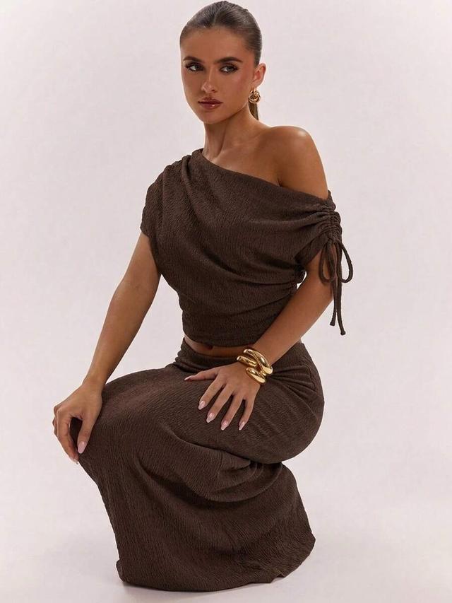 brown asymmetric neck top and midi skirt set