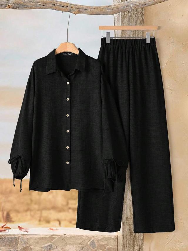black casual commuter button-up shirt