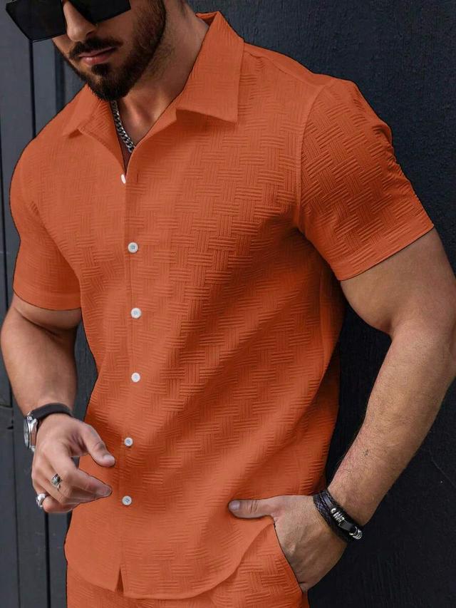 orange textured short sleeve button up shirt