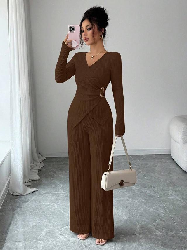 dark brown ribbed cross v-neck top and wide leg trousers