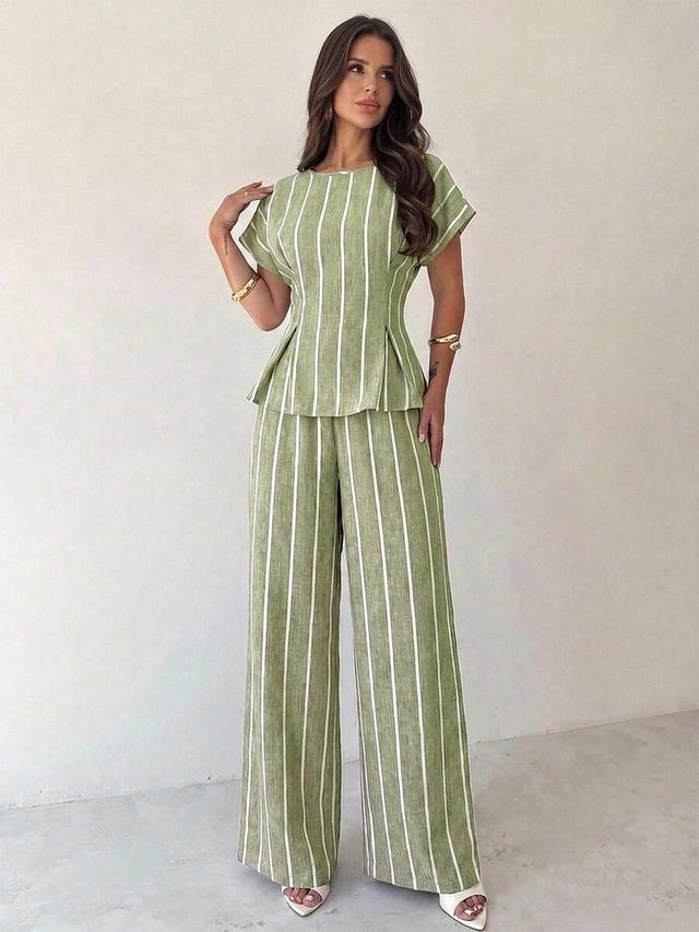 sage green striped ruched waist blouse and loose trousers
