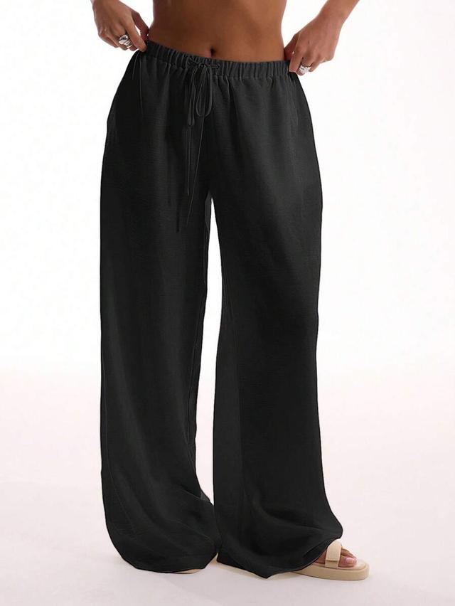 black textured linen feel tie waist wide leg trousers