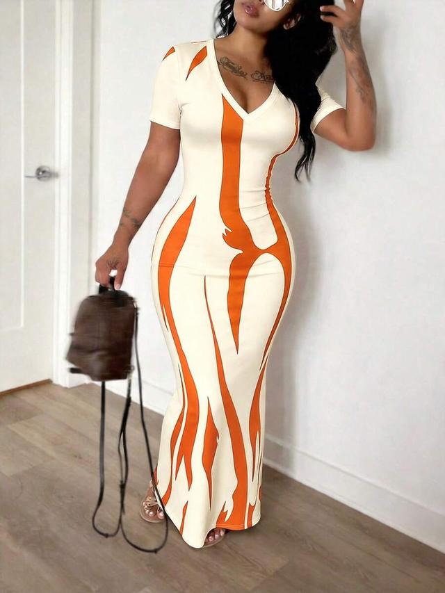 cream and orange abstract print bodycon maxi dress