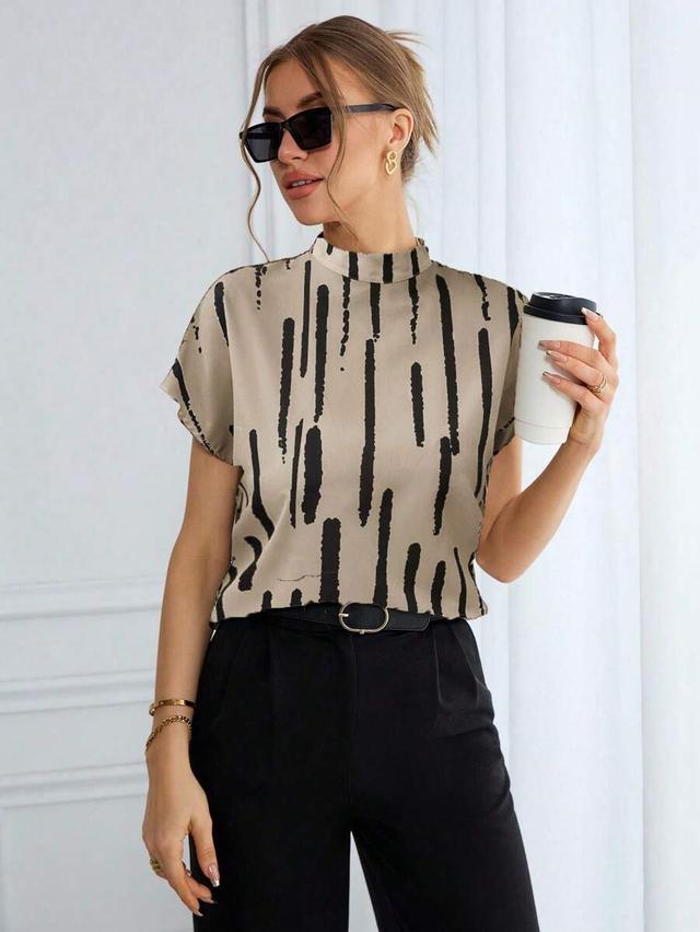 beige batwing short sleeve shirt with line print