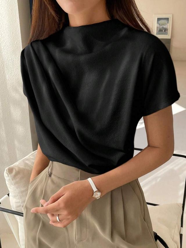 black mock neck batwing sleeve business casual tee