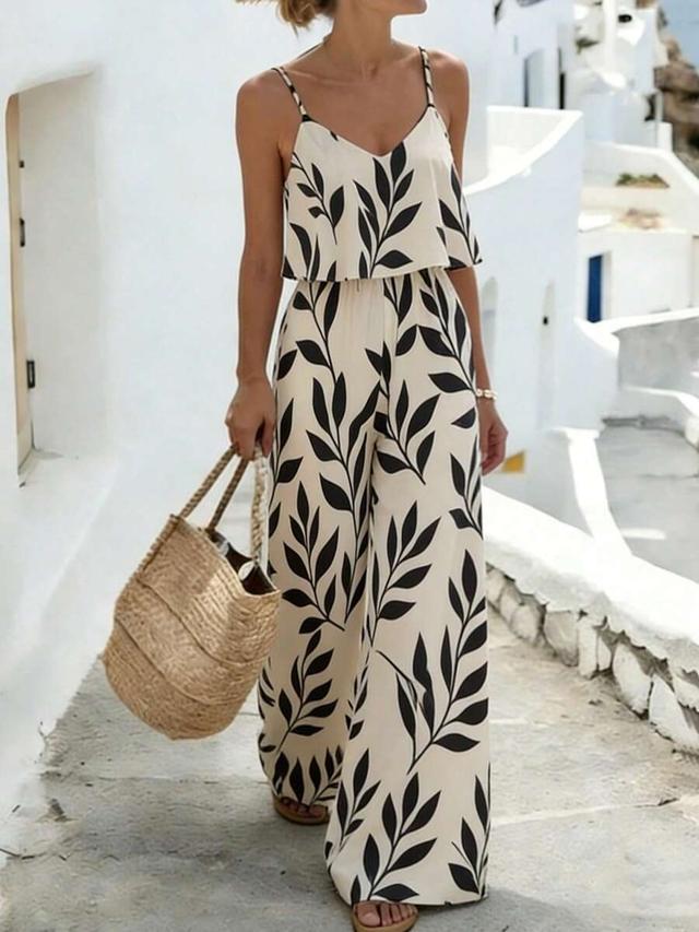 cream and black leaf print sleeveless jumpsuit