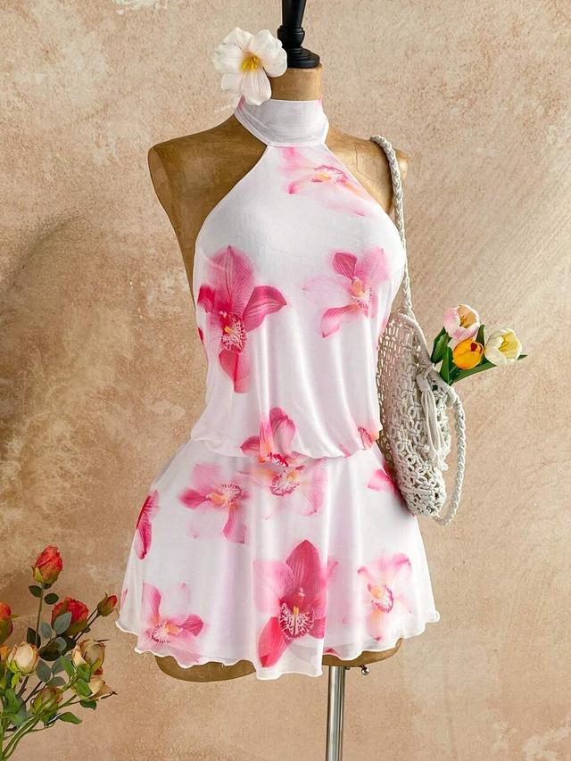white halter neck dress with pink orchid print
