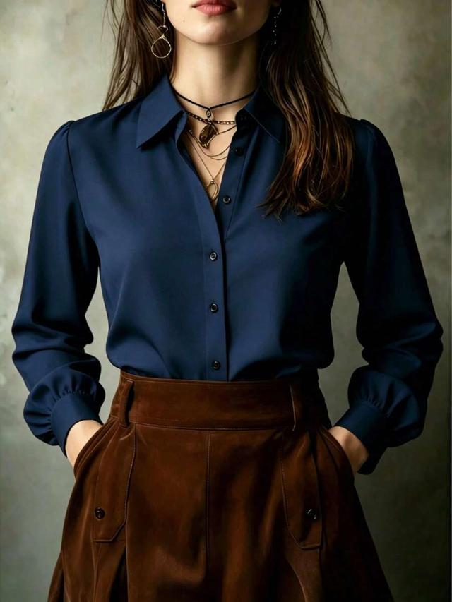 solid navy blue long sleeve button up blouse