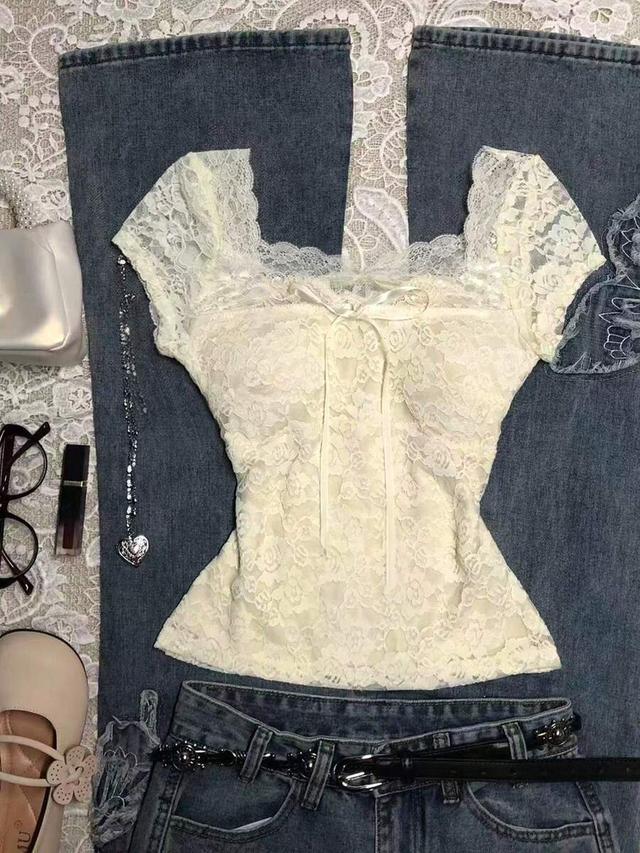 elegant cream lace top with bow decor
