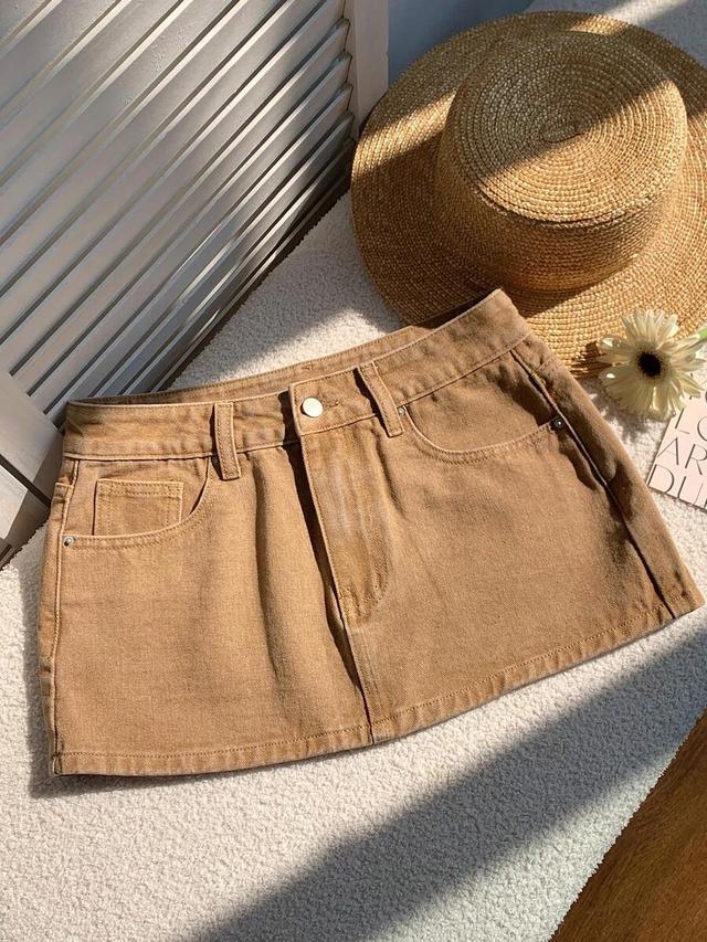 brown denim mini skirt with classic five-pocket styling