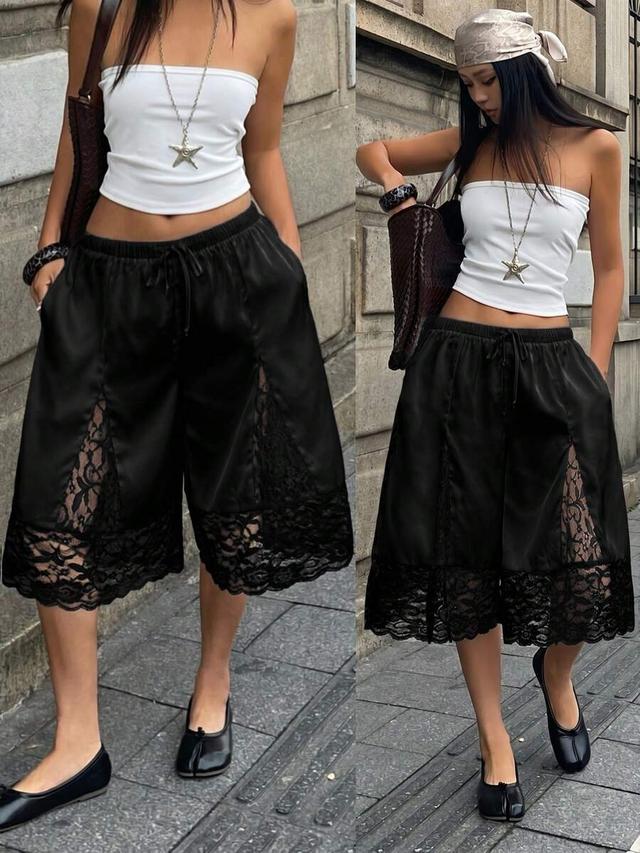black satin shorts with contrast lace trim