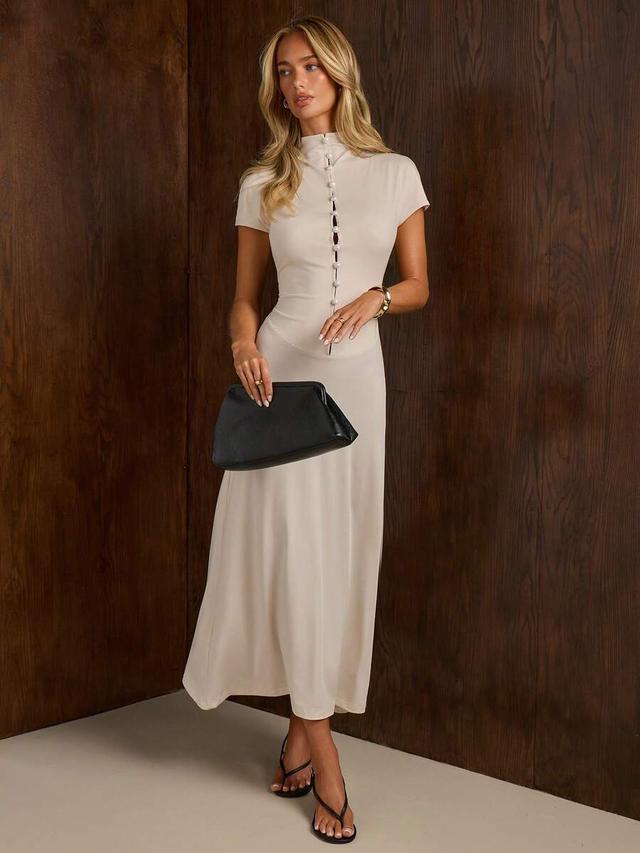 elegant cream fitted midi dress with pearl button detail