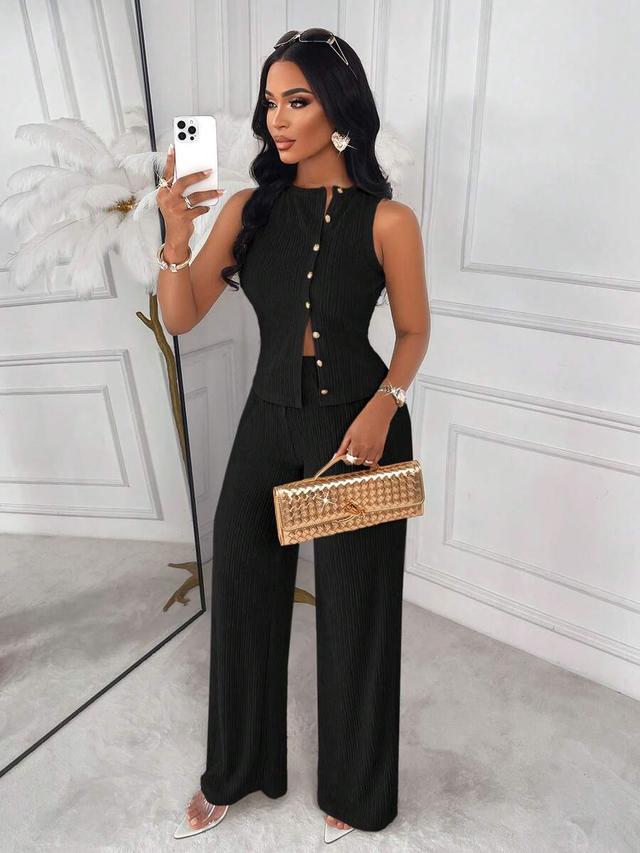 black sleeveless ribbed top and straight leg pants set