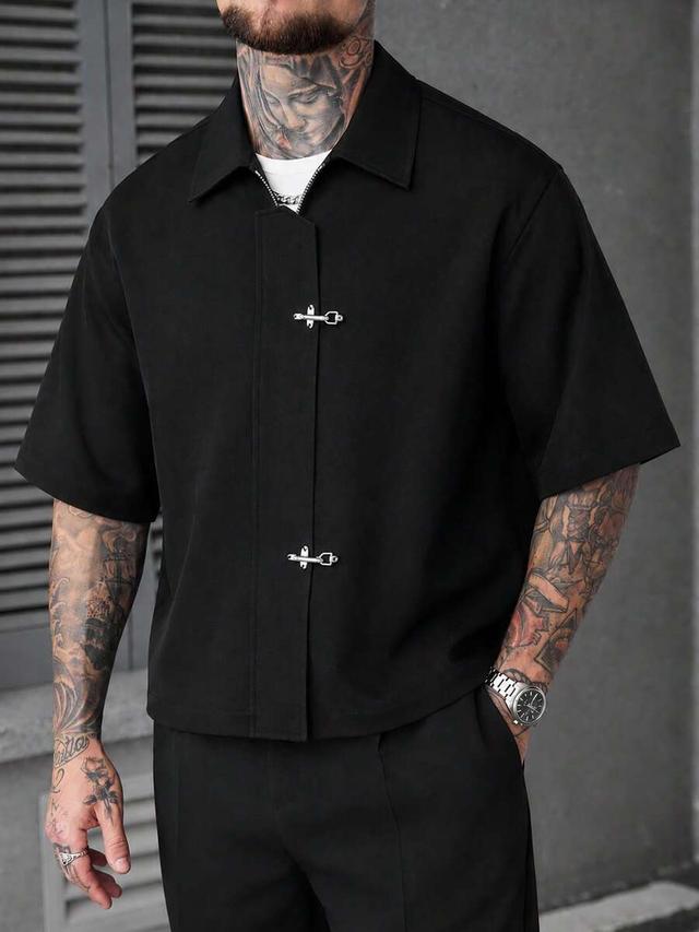 black short sleeve commuter shirt with buckle placket